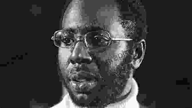 A Black And White Portrait Of Curtis Mayfield Wearing A Suit And Tie, With A Serious Expression And His Eyes Gazing Out Of The Frame Traveling Soul: The Life Of Curtis Mayfield