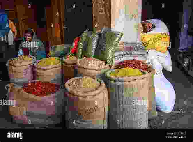 A Bustling Spice Market In Delhi, Where Vendors Sell A Wide Variety Of Spices And Herbs. Masala Memories: Travels In The Land Of Colour