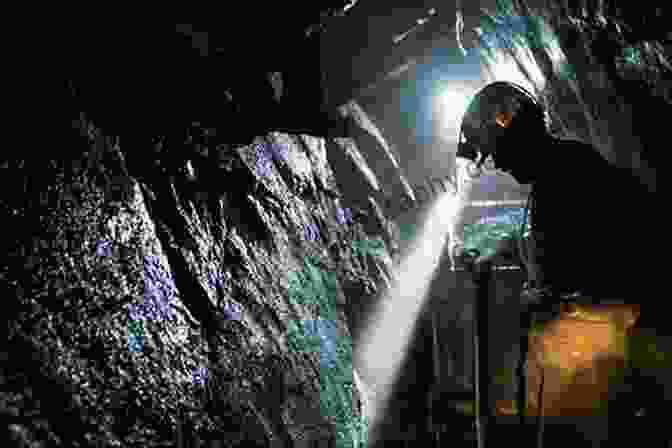 A Deep, Subterranean Coal Mine With Miners Working Diligently To Extract Coal Seams, Their Headlamps Illuminating The Darkness. Railways And Industry In The Western Valley: Aberbeeg To Brynmawr And EBBW Vale (South Wales Valleys)