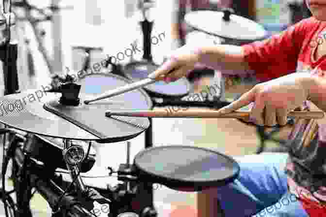 A Drummer Playing A Drum Set With Their Hands And Feet. Coordination Breakdown: A Crash Course In Drumming