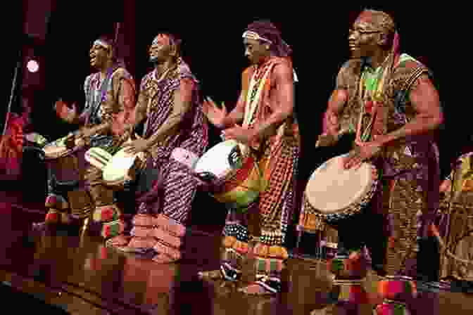 A Group Of African Musicians Playing Traditional Instruments On Stage, Surrounded By An Audience Music Performance And African Identities (Routledge African Studies 3)