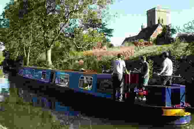 A Narrowboat Cruises Through The Picturesque Cotswolds, Surrounded By Rolling Hills, Stone Cottages, And Lush Greenery. Too Narrow To Swing A Cat: Going Nowhere In Particular On The English Waterways
