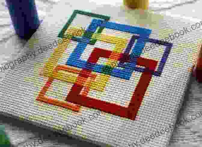 A Photograph Of A Contemporary Penny Square Embroidery Piece Featuring A Geometric Pattern In Vibrant Colors Old Fashioned Redwork And Penny Square Embroidery