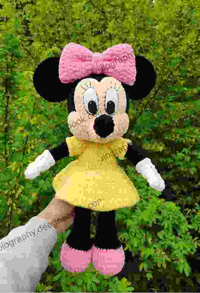 A Stylish And Adorable Crocheted Minnie Mouse Doll With A Polka Dot Dress And A Big Red Bow Disney Amigurumi For Newbie: Amazing Pattern To Make Disney Dolls: Disney Pattern For Beginners