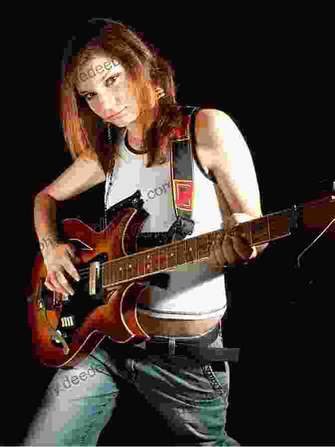 A Young Woman Playing An Electric Guitar On Stage Hal Leonard Guitar Method 2: Second Edition