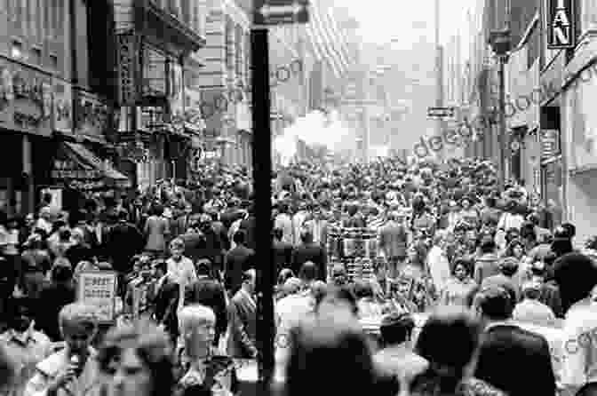 Black And White Photograph Of A Crowded London Street In The 1960s, With People Wearing Colorful Clothing And Mini Skirts Sister Stardust: A Novel Jane Green