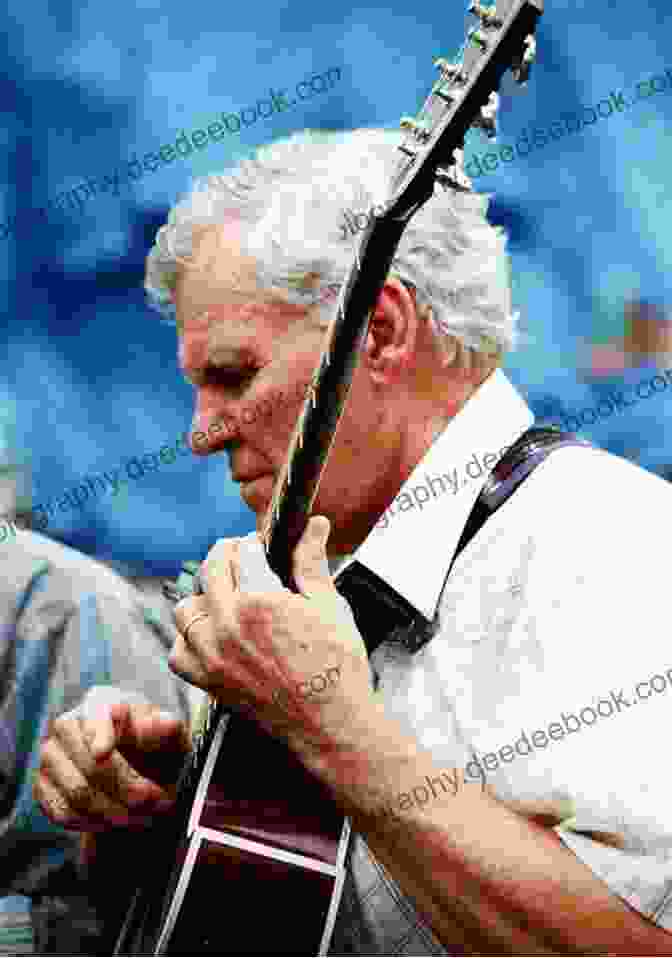 Doc Watson, A Legendary Folk Singer And Guitarist, Plays His Guitar. Raised By Musical Mavericks: Recalling Life Lessons From Pete Seeger Lightnin Hopkins Doc Watson Reverend Gary Davis And Others