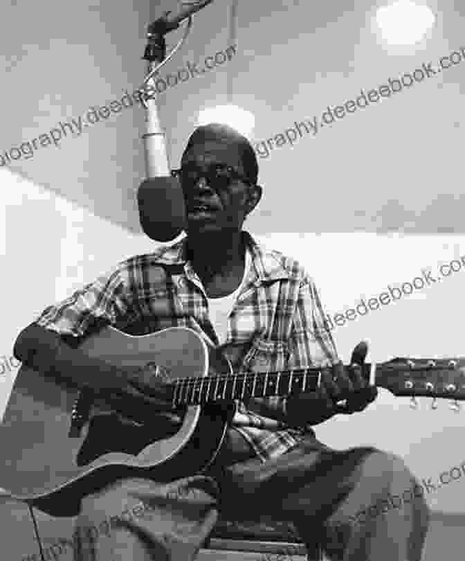 Lightnin' Hopkins, A Legendary Blues Musician, Strums His Guitar. Raised By Musical Mavericks: Recalling Life Lessons From Pete Seeger Lightnin Hopkins Doc Watson Reverend Gary Davis And Others
