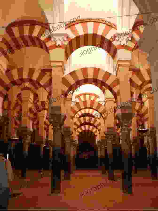The Mezquita Cathedral In Cordoba Is A Stunning Example Of Moorish Architecture. The Muslim Occupation Of Al Andalus: From 711 AD To 1492 AD (Visit Andalucia)